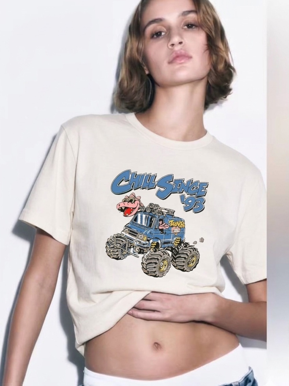 John GaltCream Tee with Blue 'Chill Since '93' Monster Truck Graphic